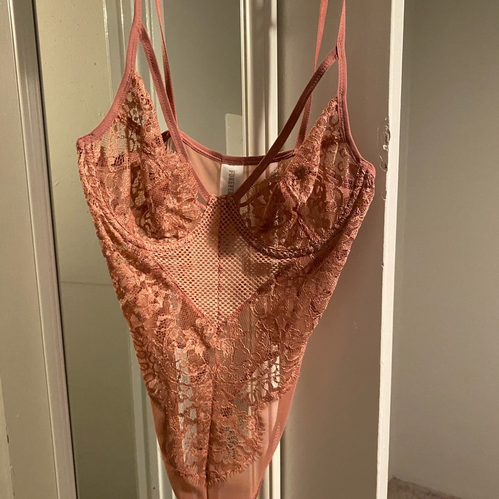 Pink lingerie bodysuit